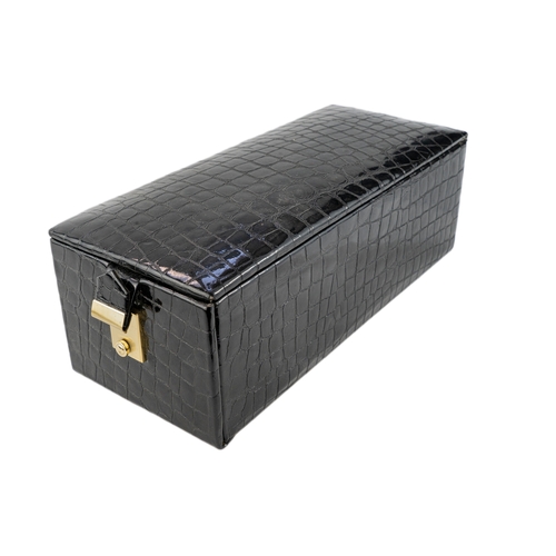 153 - Faux Crocodile Leather Jewellery Box   

Of rectangular form, a faux leather jewellery box featuring... 