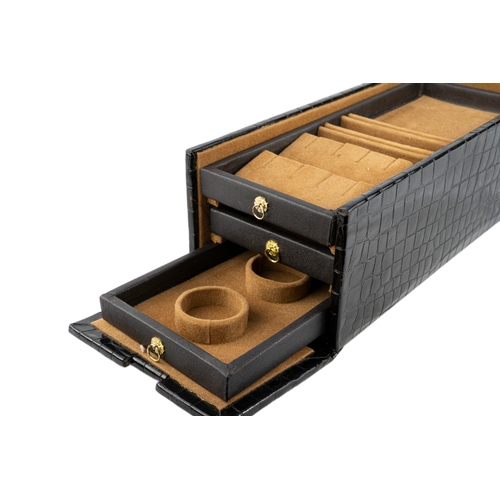 153 - Faux Crocodile Leather Jewellery Box   

Of rectangular form, a faux leather jewellery box featuring... 