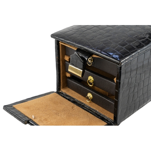 153 - Faux Crocodile Leather Jewellery Box   

Of rectangular form, a faux leather jewellery box featuring... 