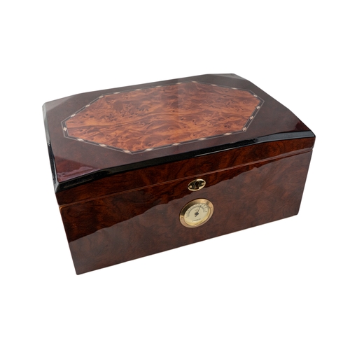 160 - Lacquer Burgundy and Cigar Humidor, Keyhole Lock With Hygrometer   

A large burgundy and brown lacq... 