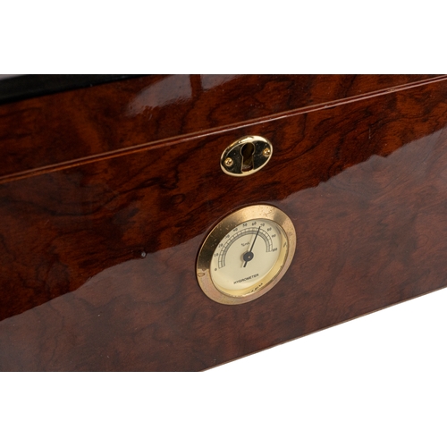 160 - Lacquer Burgundy and Cigar Humidor, Keyhole Lock With Hygrometer   

A large burgundy and brown lacq... 