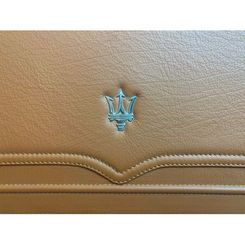 168 - A Maserati Suitcase

A tan leather case featuring stitched grille pattern and Maserati Trident badge... 