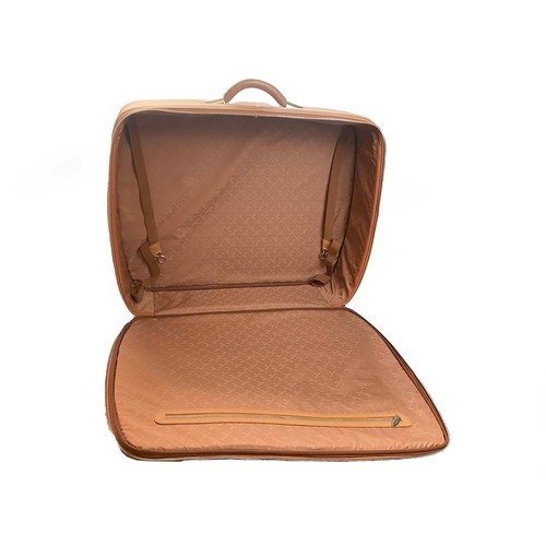 168 - A Maserati Suitcase

A tan leather case featuring stitched grille pattern and Maserati Trident badge... 