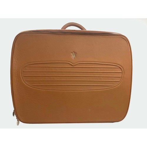 168 - A Maserati Suitcase

A tan leather case featuring stitched grille pattern and Maserati Trident badge... 