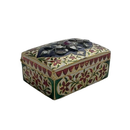 170 - Mughal Gold Enamel Diamond And Ruby Set Box 

A diamond and ruby set enamelled hexagonal box, of rec... 