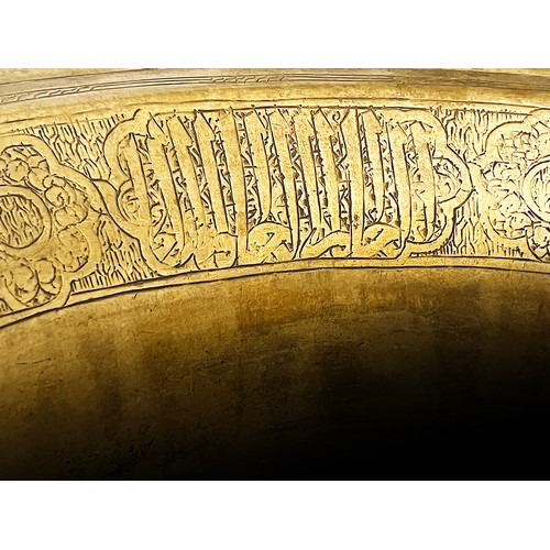 107 - A LARGE MAMLUK BRASS BASIN, 

With high body bowl and flaring mouth,  engraved  large thuluth inscri... 