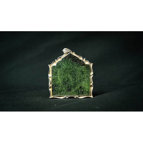 1 - A SILVER FRAMED GREEN INTAGLIO, 19TH CENTURY IRAN The square pendant engraved on one side with seven... 