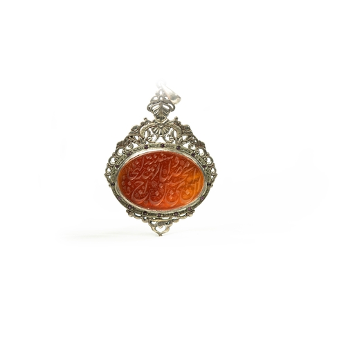 12 - A HIGHLY DECORATIVE SILVER FRAMED AGATE PENDANT Of oval form, a pendant comprising a brown agate, Ar... 