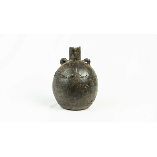 125 - A FLASK WITH QUFIC INSCRIPTION,14th/15th CENTURY, Of flattened circular shape, resting on a flat bas... 