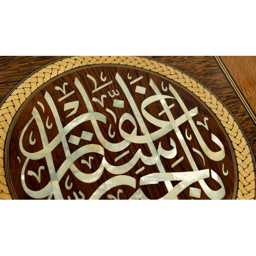 163 - AN OTTOMAN TURKISH INLAID WOODEN CALLIGRAPHY PANEL, The panel inlaid with pearl to depict calligraph... 