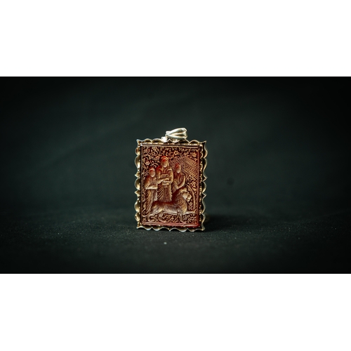 2 - A SILVER FRAMED CARNELIAN CARVED PENDANT WITH A DEPICTION OF FOUR KHALIFAS IRAN, TAHRAN 20TH CENTURY... 