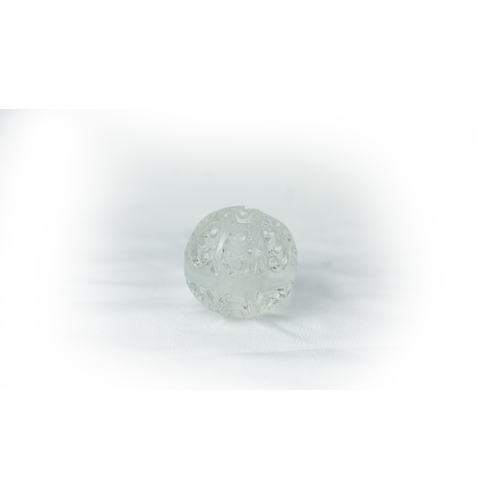 40 - AN INTAGLIO ROCK CRYSTAL OBJECT Of globe form, the rock crystal surface intricately carved, 84 gr, 6... 