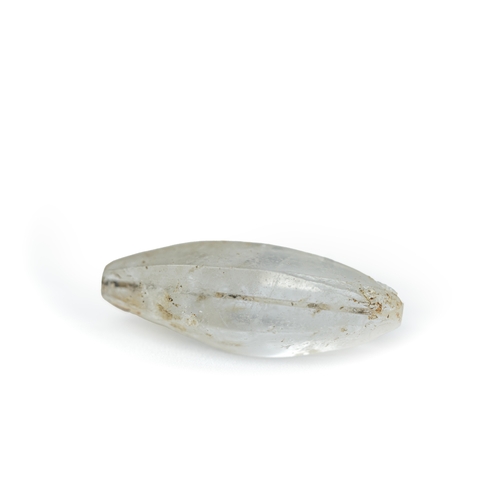 44 - ROCK CRYSTAL ELONGATED BEAD Of elongated cylinder form, tapering towards the ends, with a horizontal... 