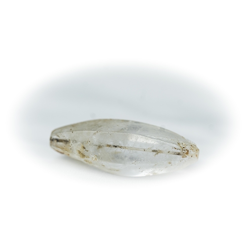 44 - ROCK CRYSTAL ELONGATED BEAD Of elongated cylinder form, tapering towards the ends, with a horizontal... 