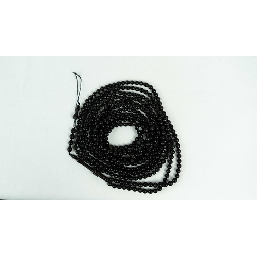 67 - AN EBONY DHIKIR PRAYER, INVOCATION BEADS 500+4 beads, 65 gr, approx. 170cm