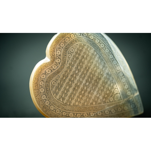 100 - A PALE GREEN JADE TALISMANIC STONE WITH ARABIC INSCRIPTIONS, Qur'an LXXVIII. sura al- Na’ba Of heart... 