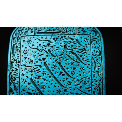 102 - A CARVED BLUE HARDSTONE TALISMANIC OBJECT WITH ARABIC INSCRIPTION, Of rectangular shape with a point... 