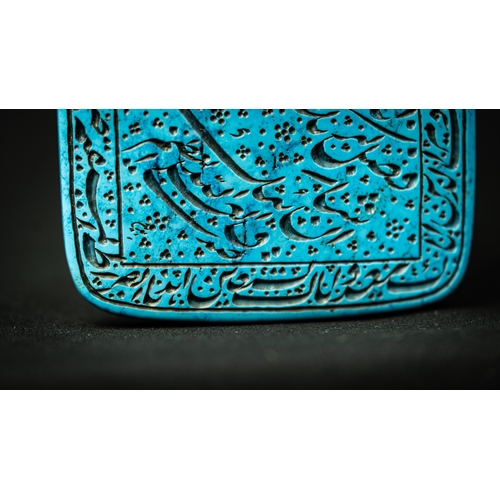 102 - A CARVED BLUE HARDSTONE TALISMANIC OBJECT WITH ARABIC INSCRIPTION, Of rectangular shape with a point... 