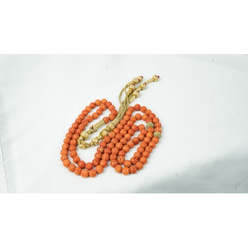 64 - CORAL PRAYER BEADS,18TH/19TH CENTURY, The tasbih strung  with 99  spherical  beads,gold and silver e... 