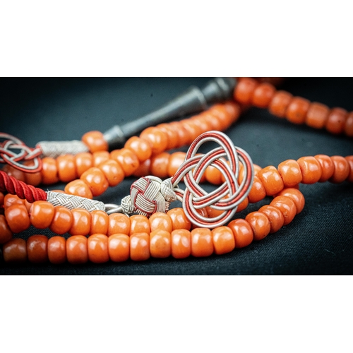 68 - A CORAL PRAYER BEADS, 18TH/19TH CENTURY, The tasbih strung  with 99 flatted spherical coral beads, s... 