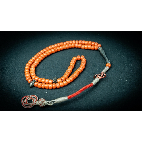 68 - A CORAL PRAYER BEADS, 18TH/19TH CENTURY, The tasbih strung  with 99 flatted spherical coral beads, s... 