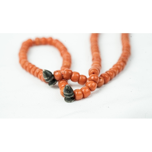 68 - A CORAL PRAYER BEADS, 18TH/19TH CENTURY, The tasbih strung  with 99 flatted spherical coral beads, s... 