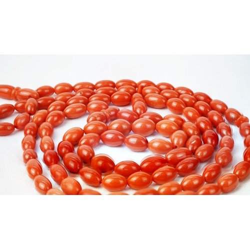 71 - A SET OF CORAL BEADS AND TURBAN FINIAL, A coral prayer beads, 99 beads for Muslim prayers, set in it... 