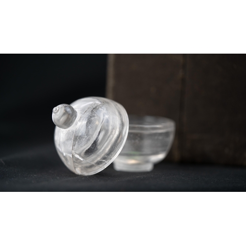 76 - ROCK CRYSTAL TINY BOWL WITH LID, Of rounded form, resting on a flat base, with a lid terminating wit... 