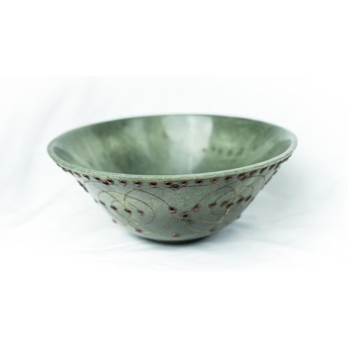 83 - A GEM SETTED PALE GREEN JADE BOWL, Of conical form, rising from short foot, the exterior decorated w... 