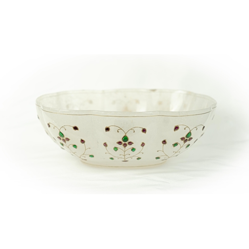 88 - A GEM SET MUGHAL BOWL, Of hemispherical form on short foot, the exterior decorated with floral spray... 