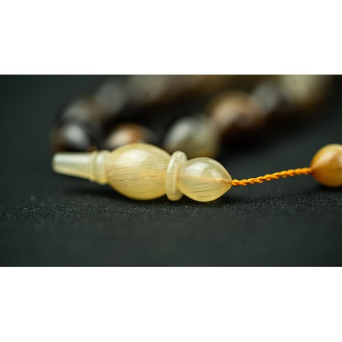 61 - The tasbih strung  with 33  ovoid  beads, flat stops, narrowing and nicely elongating imama,  precee... 