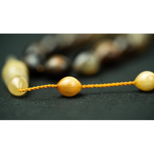 61 - The tasbih strung  with 33  ovoid  beads, flat stops, narrowing and nicely elongating imama,  precee... 