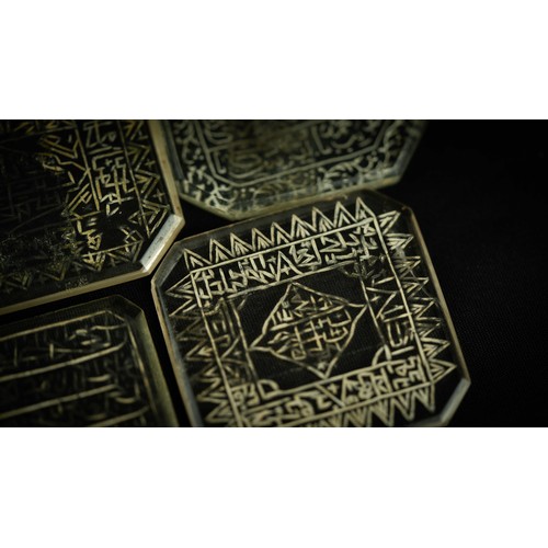 143 - A SET OF ROCK CRYSTAL TALISMANIC AND QUR’ANIC INTAGLIO PLAQUES, A group of rock crystal intaglio pla... 