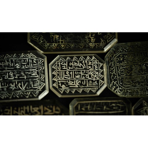 143 - A SET OF ROCK CRYSTAL TALISMANIC AND QUR’ANIC INTAGLIO PLAQUES, A group of rock crystal intaglio pla... 