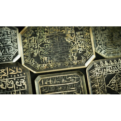 143 - A SET OF ROCK CRYSTAL TALISMANIC AND QUR’ANIC INTAGLIO PLAQUES, A group of rock crystal intaglio pla... 