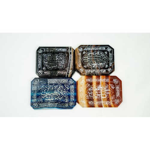 144 - A SET OF AGATE PLAQUES WITH ARABIC INSCRIPTIONS, Consisting of rectangular forms in various colours,... 