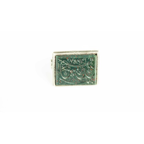 145 - A CARVED GREEN HARDSTONE SEAL RING, FIRST QUARTER OF 20TH CENTURY, Engraved inscription in nastaaliq... 