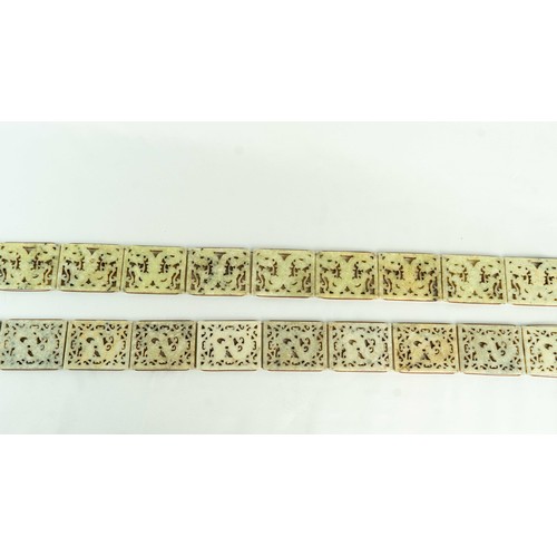 149 - TWO HARDSTONE DRAGON CARVED CHAIN BELTS, INDIA, Each formed of fourteen panels of rectangular form, ... 