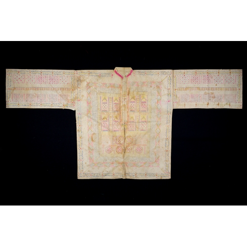 101 - A TALISMANIC SHIRT FOR A YOUNG MAN, INDIA, 17TH CENTURY, A cotton shirt (jama) adorned with an array... 