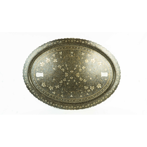 115 - SILVER IN-LAID BIDRI TRAY 19TH CENTURY DECCAN, INDIA, Of oval form, the centre featuring intricate s... 