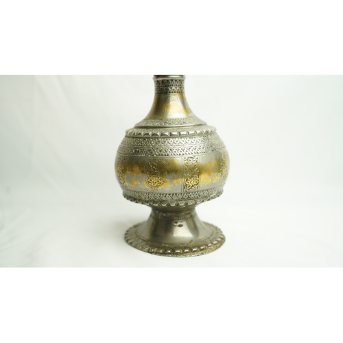 119 - AN INDIAN BRASS BOTTLE, INDIA, 19TH CENTURY, Of pyriform form, the globular body resting on sprayed ... 