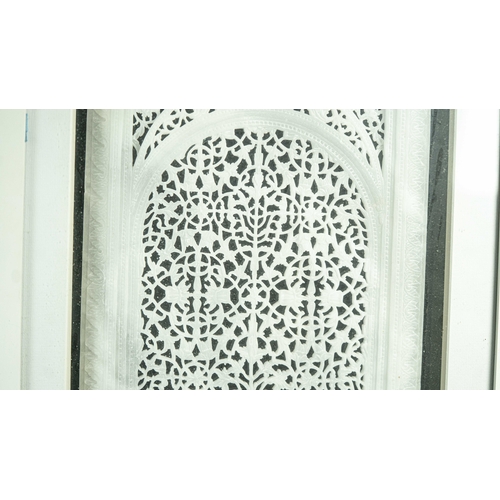 12 - A DECORATIVE CARVED AND PIERCED WHITE MARBLE JALI SCREEN, Of rectangular form, an ornately carved ma... 