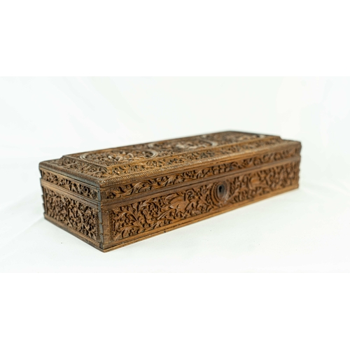 19 - AN ANGLO-INDIAN CARVED WOODEN BOX WITH GOD FIGURES, LATE 19TH CENTURY, Of rectangular form, resting ... 