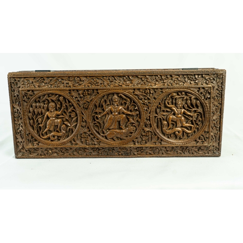 19 - AN ANGLO-INDIAN CARVED WOODEN BOX WITH GOD FIGURES, LATE 19TH CENTURY, Of rectangular form, resting ... 