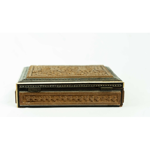 22 - AN ENGRAVED WOODEN BOX WITH A LANDSCAPE, Of rectangular form, a wooden box with a hinged lid, restin... 