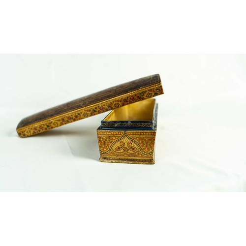 55 - LARGE KASHMIRI PAPIER M CHÉ BOX, Of rectangular form, with convex lid, painted with profusely scroll... 