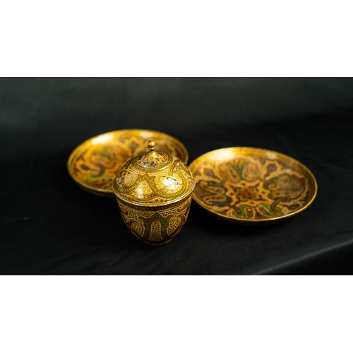 56 - A SET OF KASHMIRI PAPIER MACHE, A globular sugar bowl with two matching saucers, decorated with typi... 