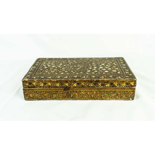 64 - A KASHMIRI PAPIER MACHÉ BOX, Of typical rectangular shape, resting on a flat base, painted in gilt a... 