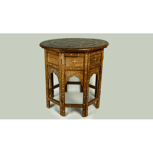 76 - A DECORATIVE DEMOUNTABLE WOOD COFFEE TABLE, Of circular form, featuring a central round cartouche ad... 