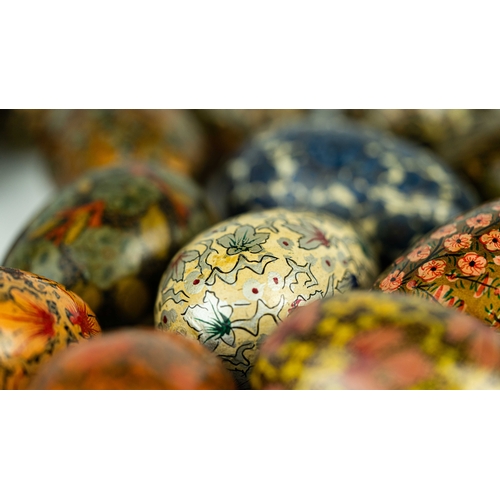 81 - 16 PAPIER-MACHÉ DECORATIVE EGGS, INDIA, All ovoid, each papier-mâché egg with a different pattern, o... 